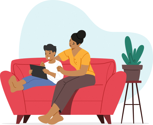 A woman with a small boy sitting on the sofa looking at the screen