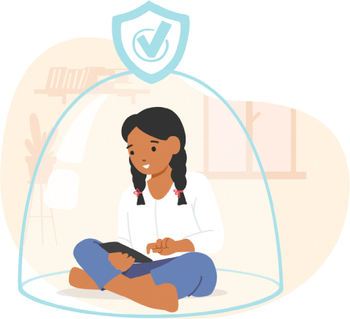 A girl sitting down alone looking at her phone